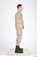  Photos Army Man in Camouflage uniform 11 21th century Army Desert uniform whole body 0008.jpg
